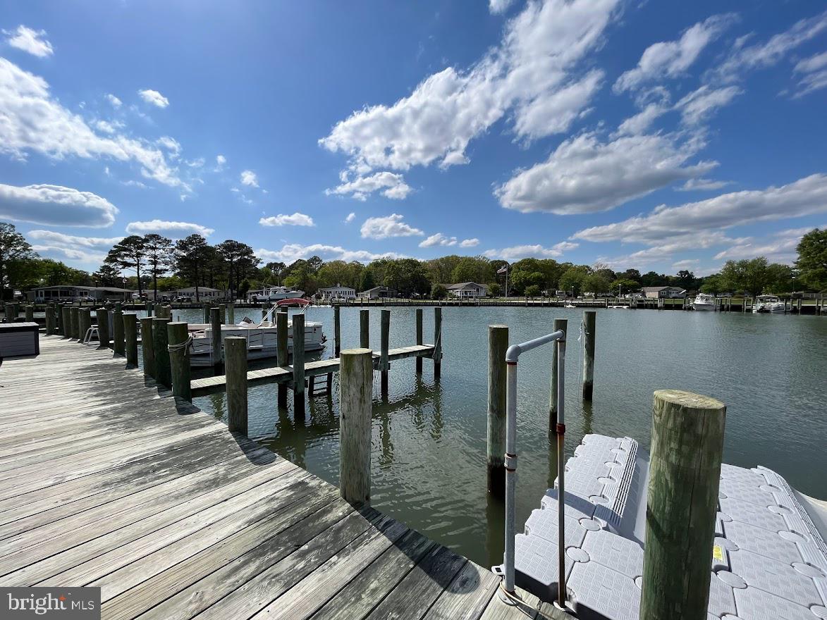 34386 Mallard Road, Unit 482 Long Neck, DE 19966 - Photo 35 of 41 a view of a terrace with chairs