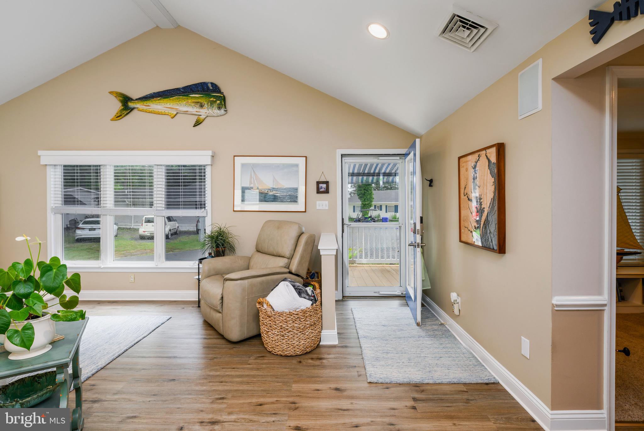 34386 Mallard Road, Unit 482 Long Neck, DE 19966 - Photo 8 of 41 a living room with furniture and a potted plant