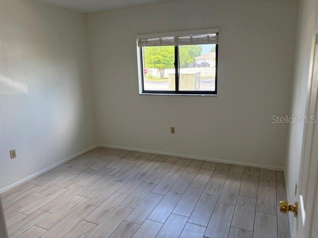 25225 Rampart Boulevard, Unit 1702 Punta Gorda, FL 33983 - Photo 15 of 19 an empty room with a window