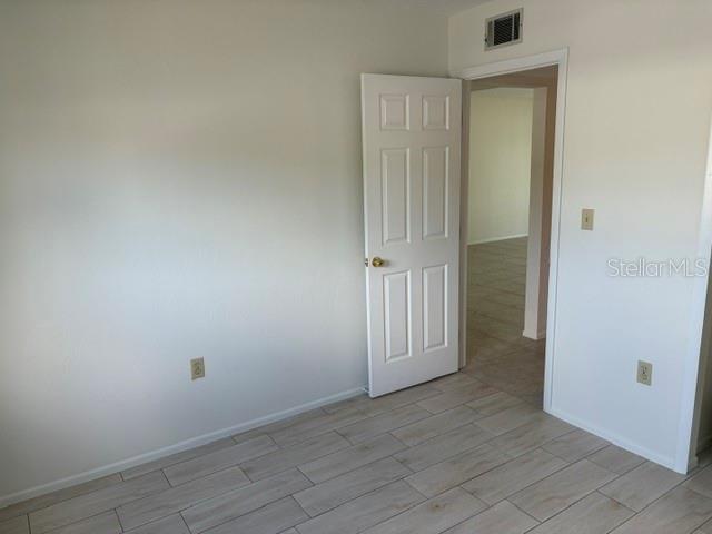 25225 Rampart Boulevard, Unit 1702 Punta Gorda, FL 33983 - Photo 16 of 19 an empty room with window