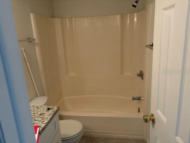 25225 Rampart Boulevard, Unit 1702 Punta Gorda, FL 33983 - Photo 17 of 19 a bathroom with a toilet and a bath tub