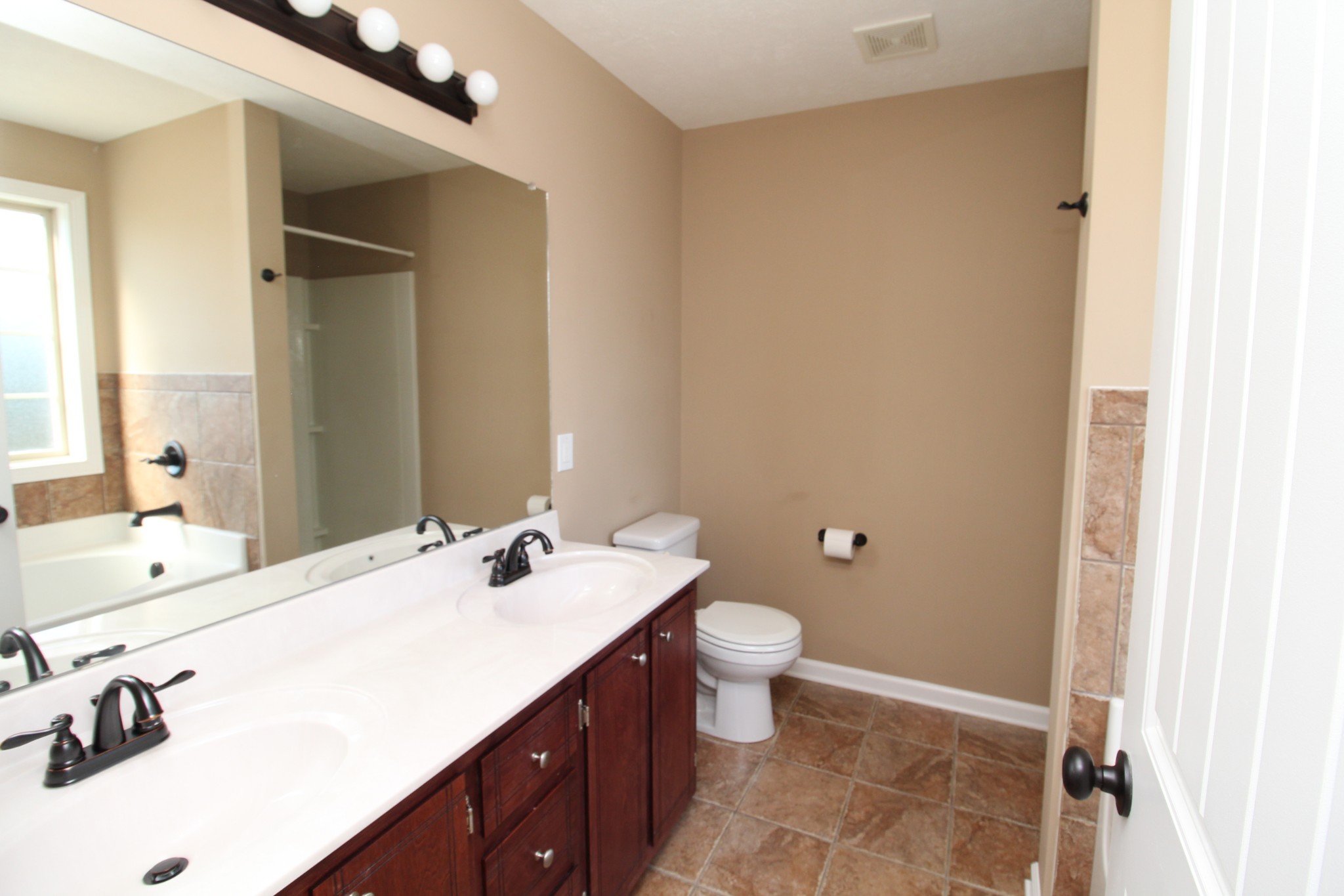 834 7 Mile Ferry Road Clarksville, TN 37040 - Photo 6 of 15 a bathroom with a sink and a mirror