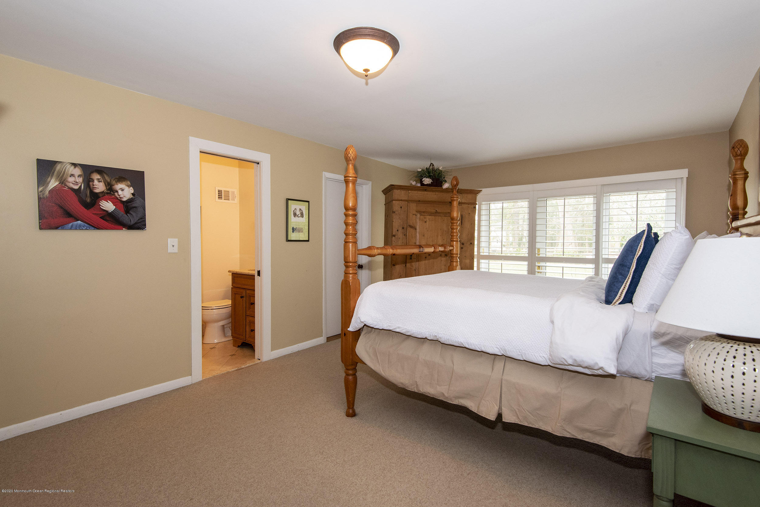 45 Hance Road Fair Haven, NJ 07704 - Photo 14 of 35 a spacious bedroom with a bed and a window