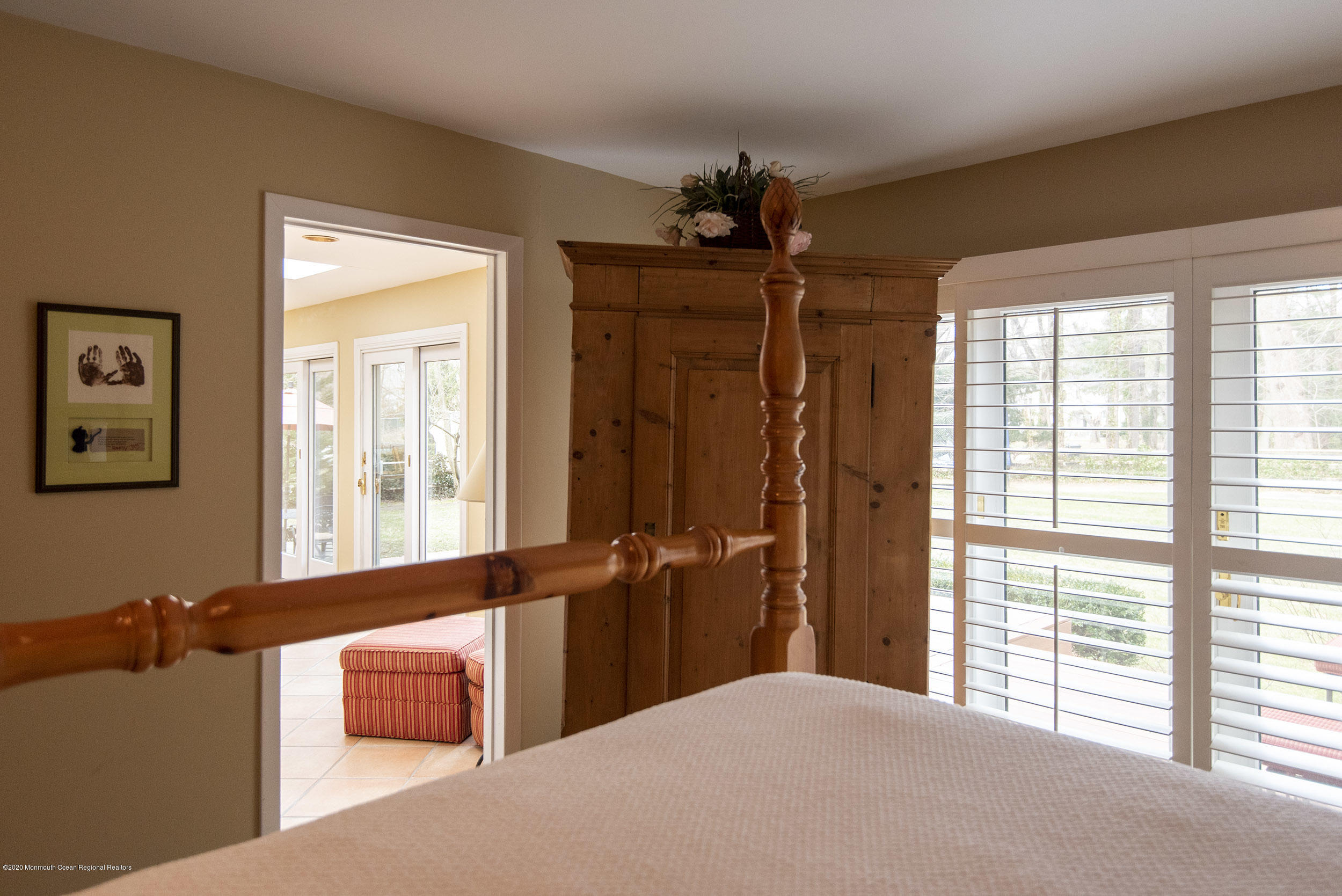 45 Hance Road Fair Haven, NJ 07704 - Photo 15 of 35 a bedroom with a large bed and a window