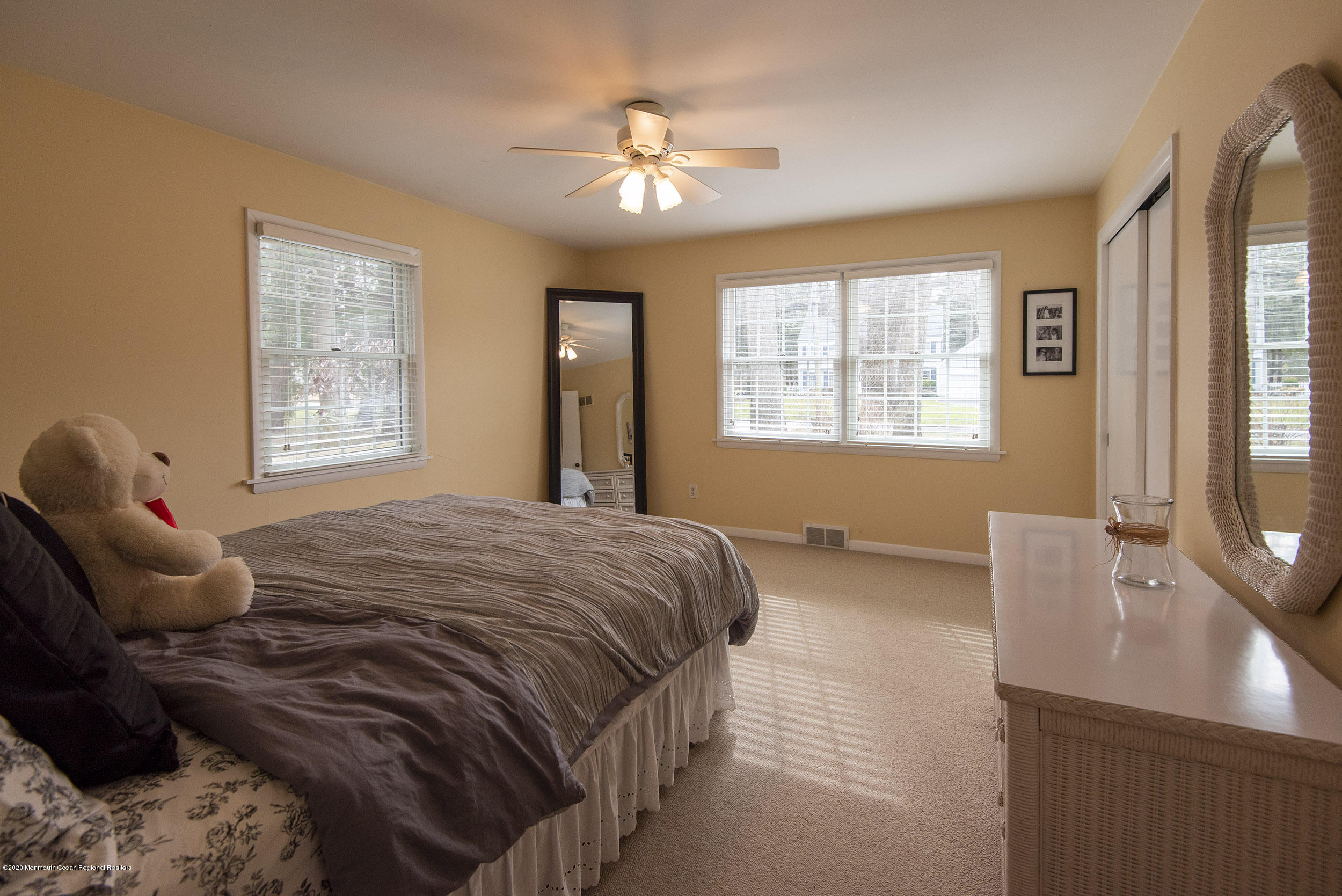 45 Hance Road Fair Haven, NJ 07704 - Photo 17 of 35 a bedroom with a bed and wooden floor