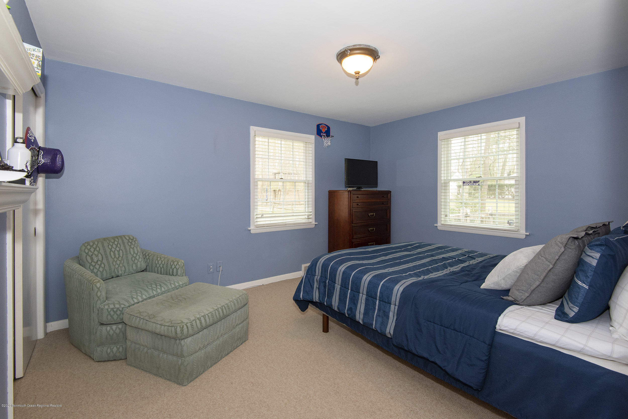 45 Hance Road Fair Haven, NJ 07704 - Photo 18 of 35 a bedroom with bed couch and window