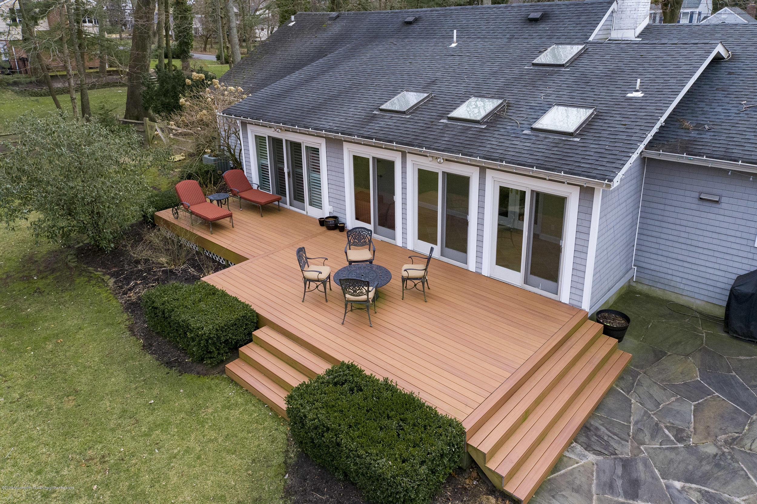 45 Hance Road Fair Haven, NJ 07704 - Photo 28 of 35 a view of a patio with table and chairs with wooden fence