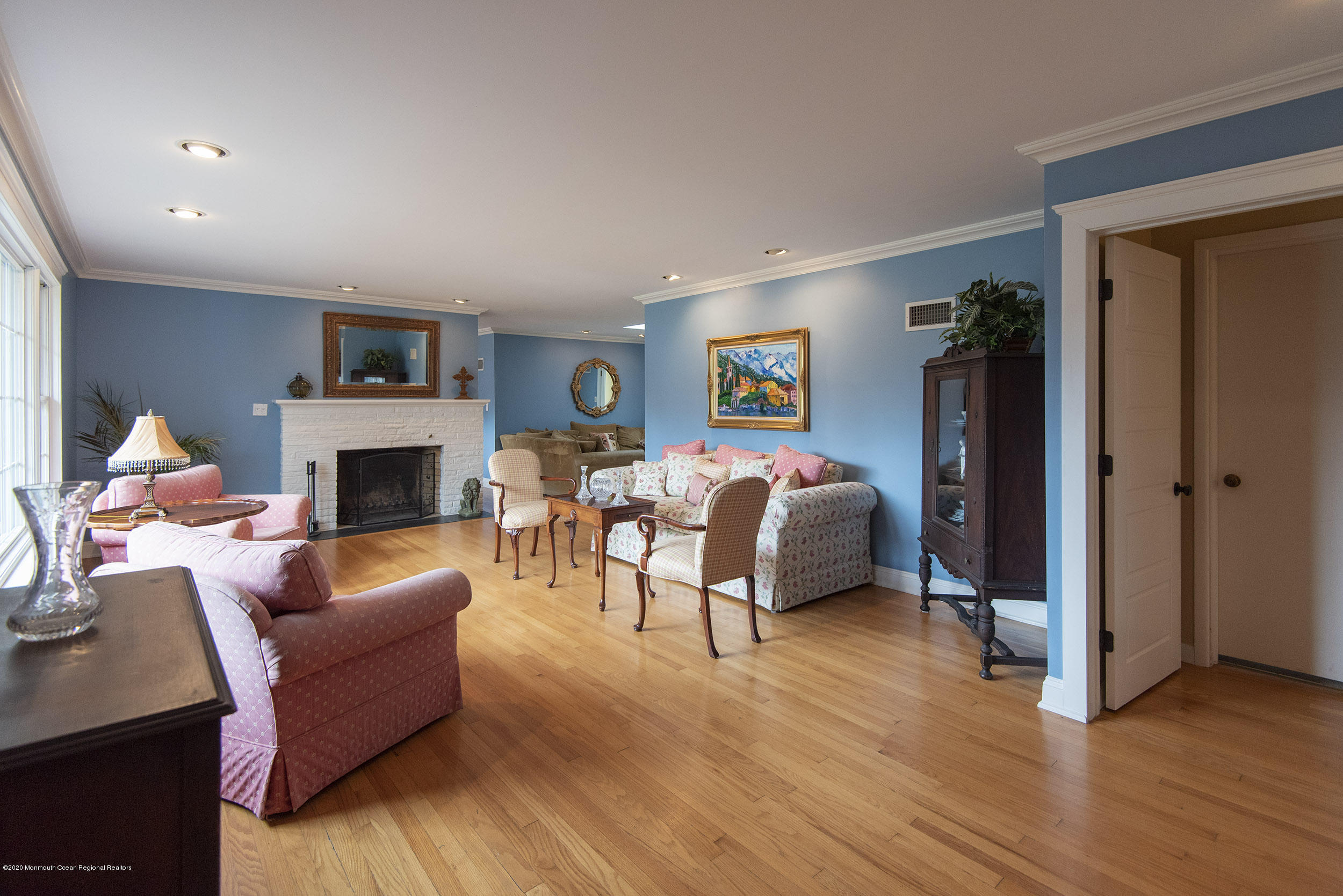 45 Hance Road Fair Haven, NJ 07704 - Photo 4 of 35 a bedroom with furniture and a fireplace