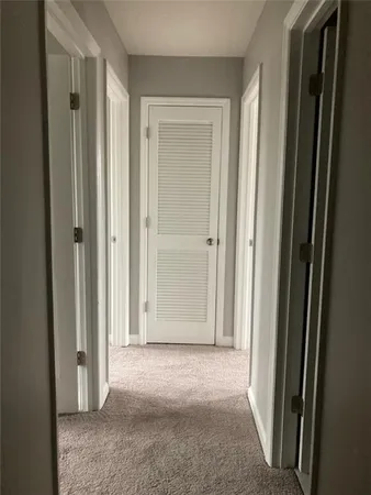 a view of a livingroom and a bathroom