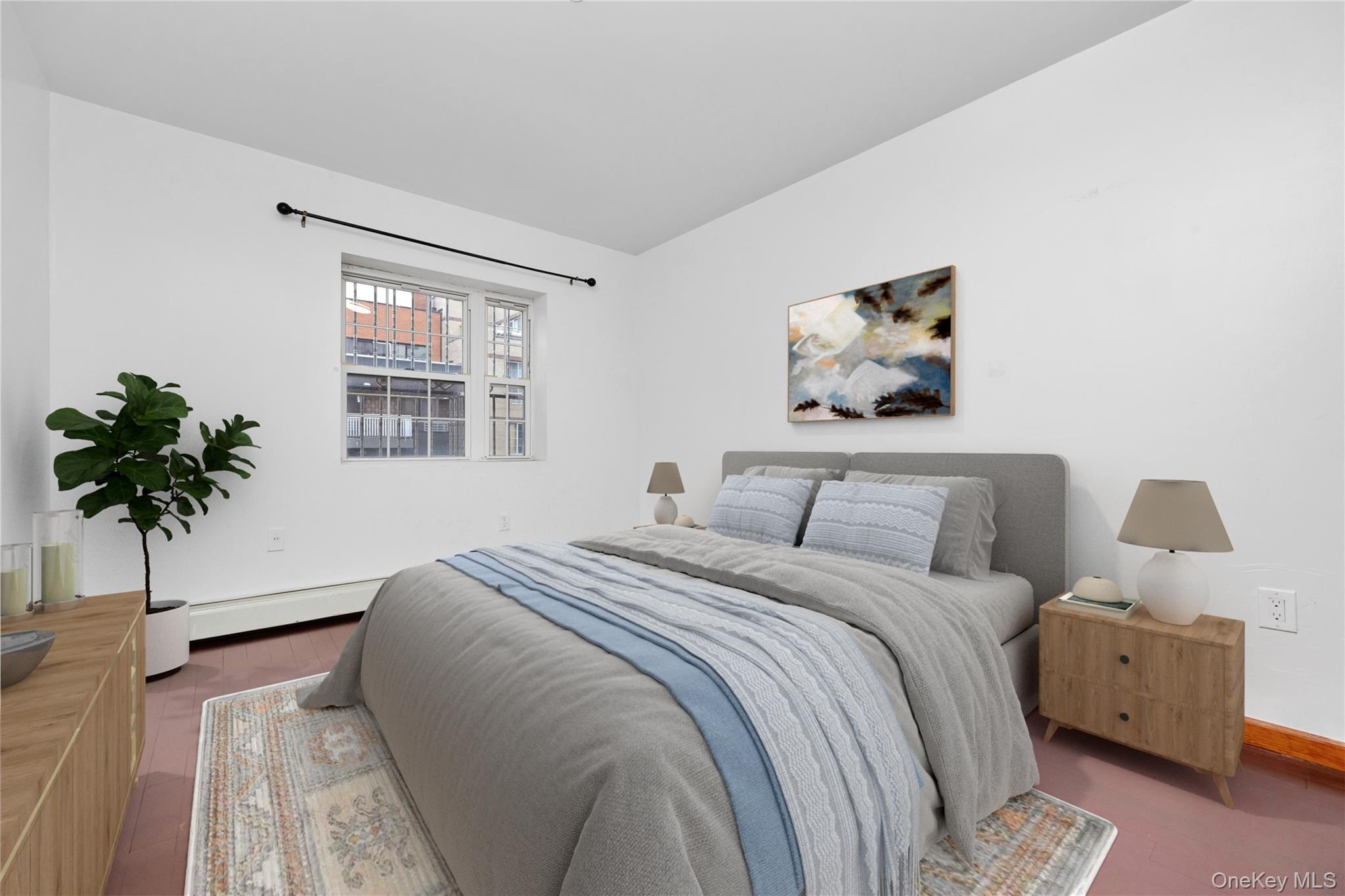 132-36 Pople Avenue, Unit 3A Queens, NY 11355 - Photo 13 of 24 Bedroom with a baseboard radiator