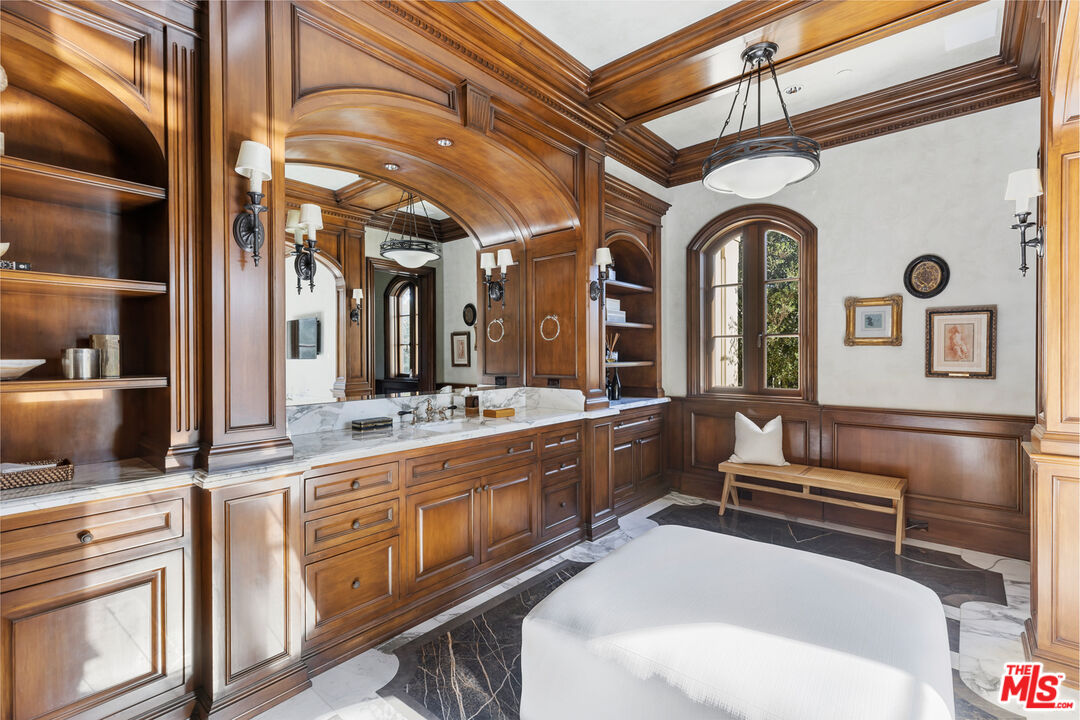 71 Beverly Park Beverly Hills, CA 90210 - Photo 23 of 45 a bathroom with sink and mirror