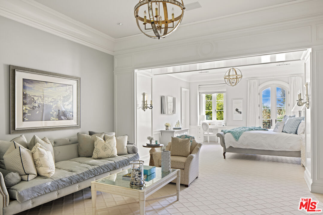 71 Beverly Park Beverly Hills, CA 90210 - Photo 28 of 45 a living room with furniture and a large window