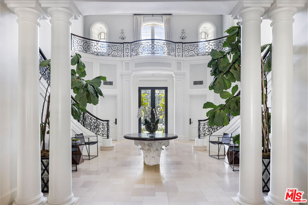 71 Beverly Park Beverly Hills, CA 90210 - Photo 5 of 45 a view of entryway and hall with wooden floor