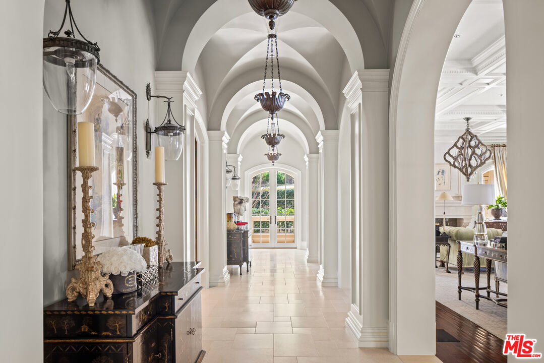 71 Beverly Park Beverly Hills, CA 90210 - Photo 6 of 45 a view of a entryway door with wooden floor