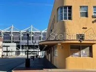 a view of a building with sitting area