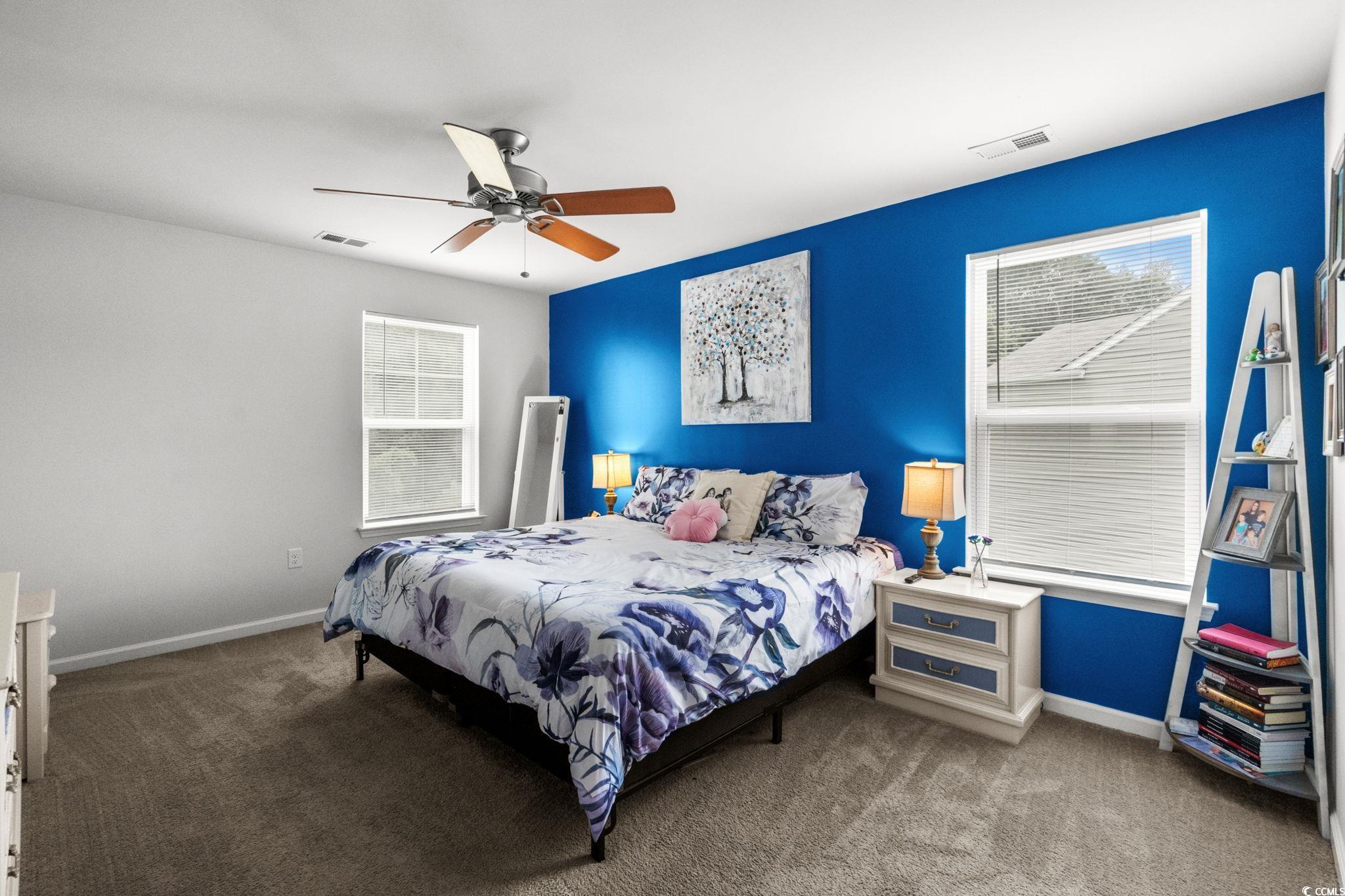 899 Snowberry Drive Longs, SC 29568 - Photo 11 of 27 Bedroom featuring carpet flooring and ceiling fan