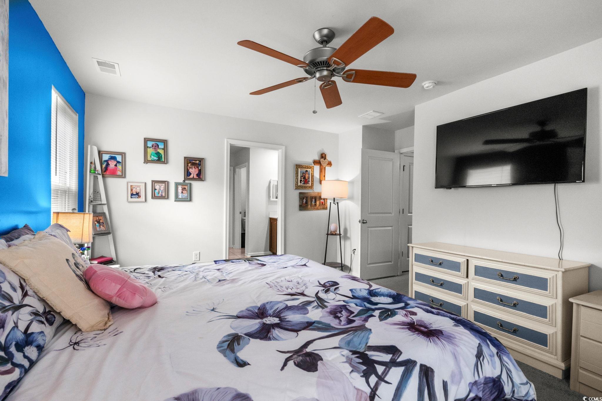 899 Snowberry Drive Longs, SC 29568 - Photo 12 of 27 Carpeted bedroom with ceiling fan