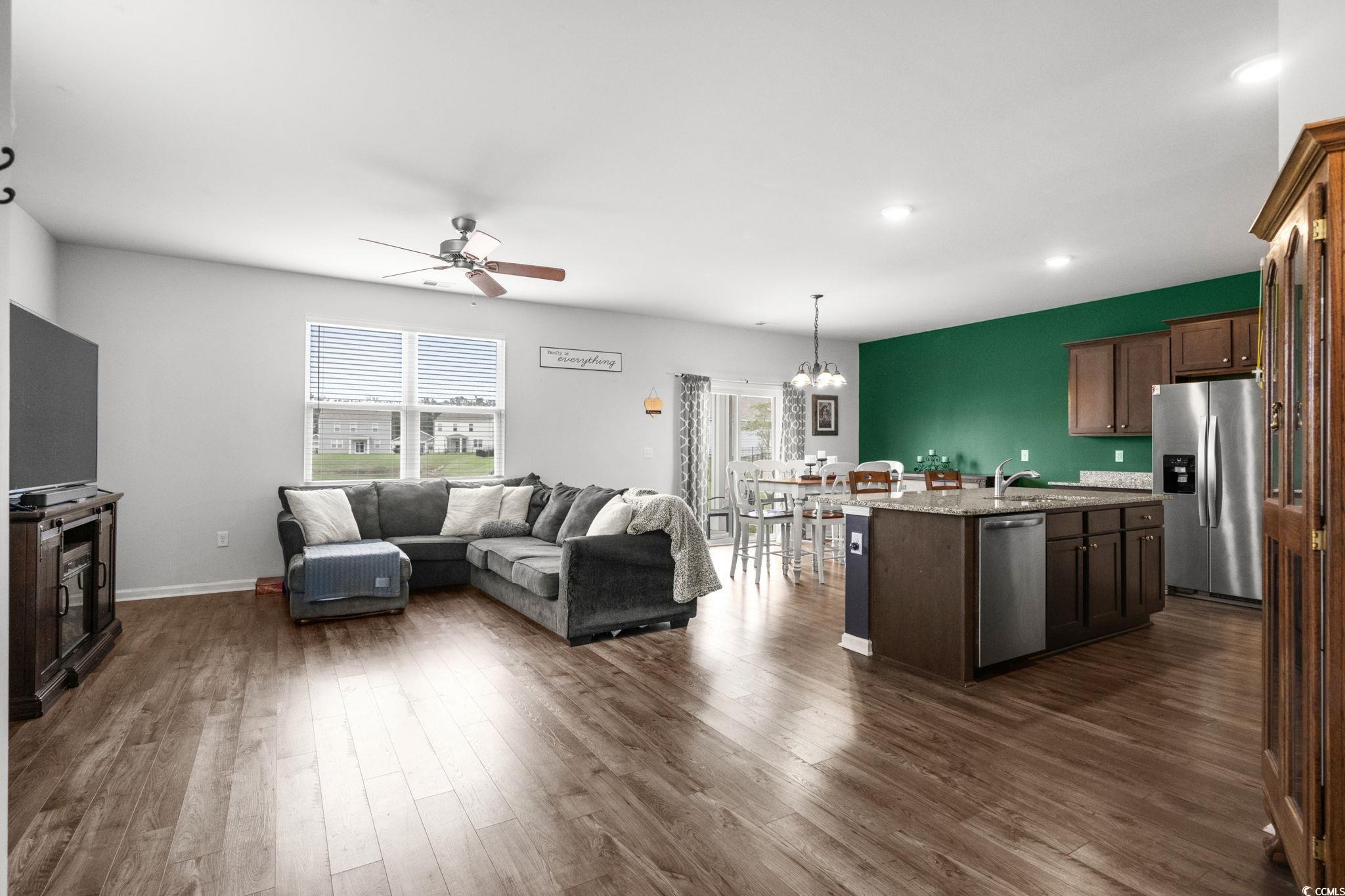 899 Snowberry Drive Longs, SC 29568 - Photo 3 of 27 Kitchen featuring plenty of natural light, a chandelier, stainless steel appliances, a kitchen island with sink, and recessed lighting