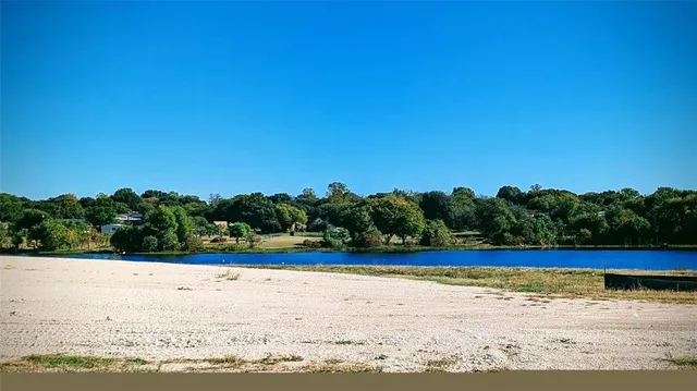 a view of a swimming pool and an outdoor space