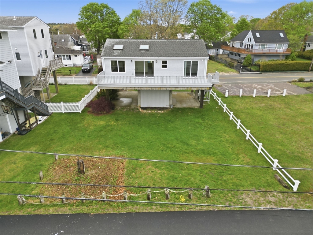 192 Swifts Beach Road Wareham, MA 02571 - Photo 8 of 38 a aerial view of a house with a yard