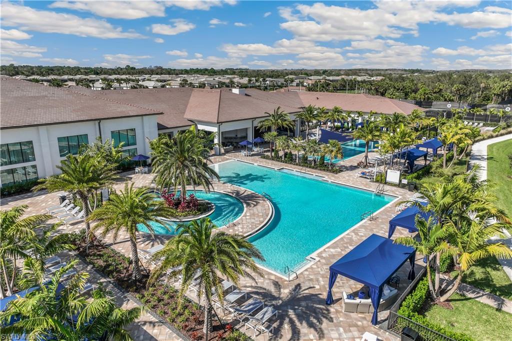 12083 Azalea Way Naples, FL 34120 - Photo 39 of 48 Resort pool with cabanas.
