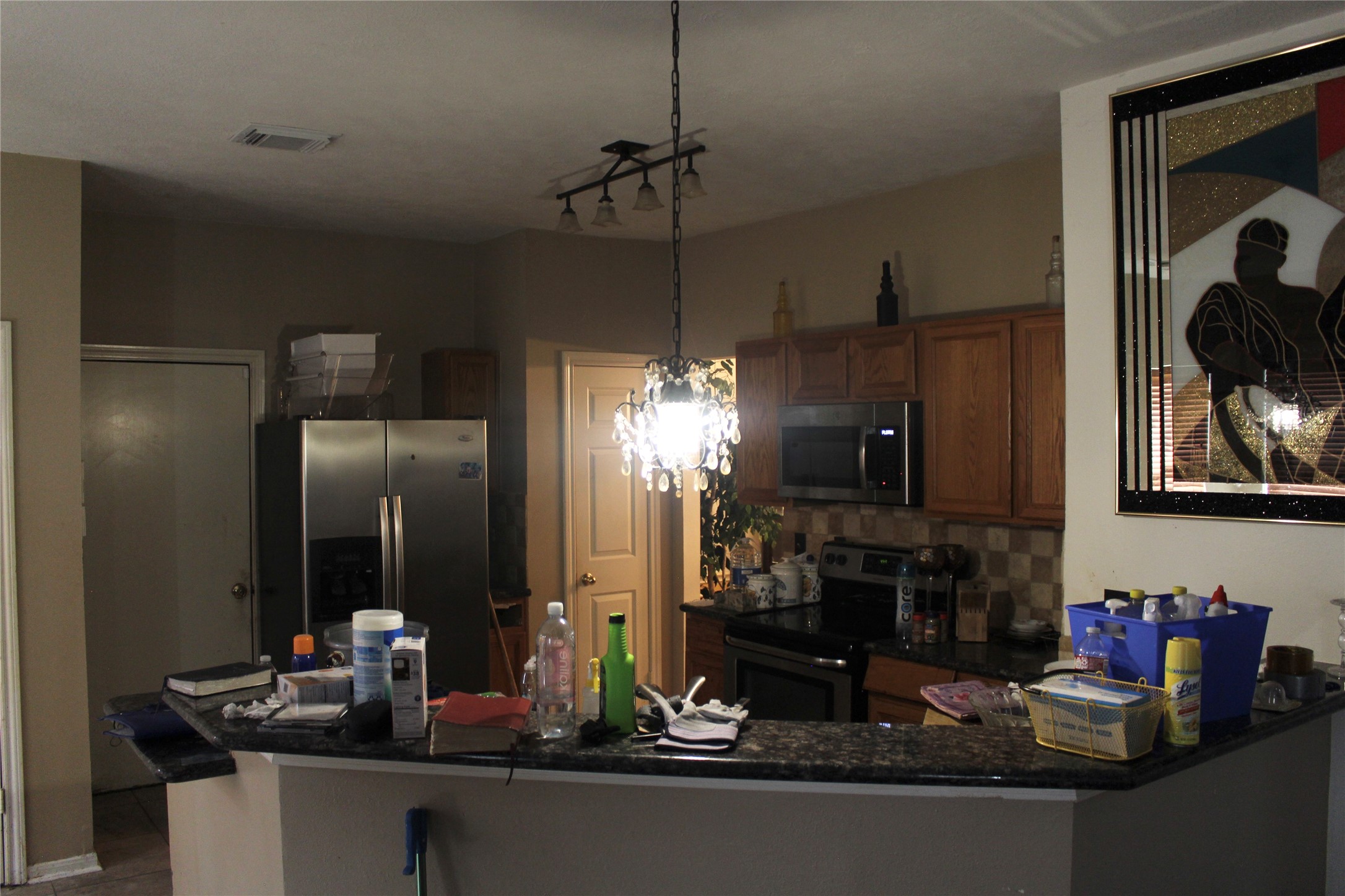 4103 Sablemist Court Houston, TX 77014 - Photo 14 of 29 a kitchen with a refrigerator and sink