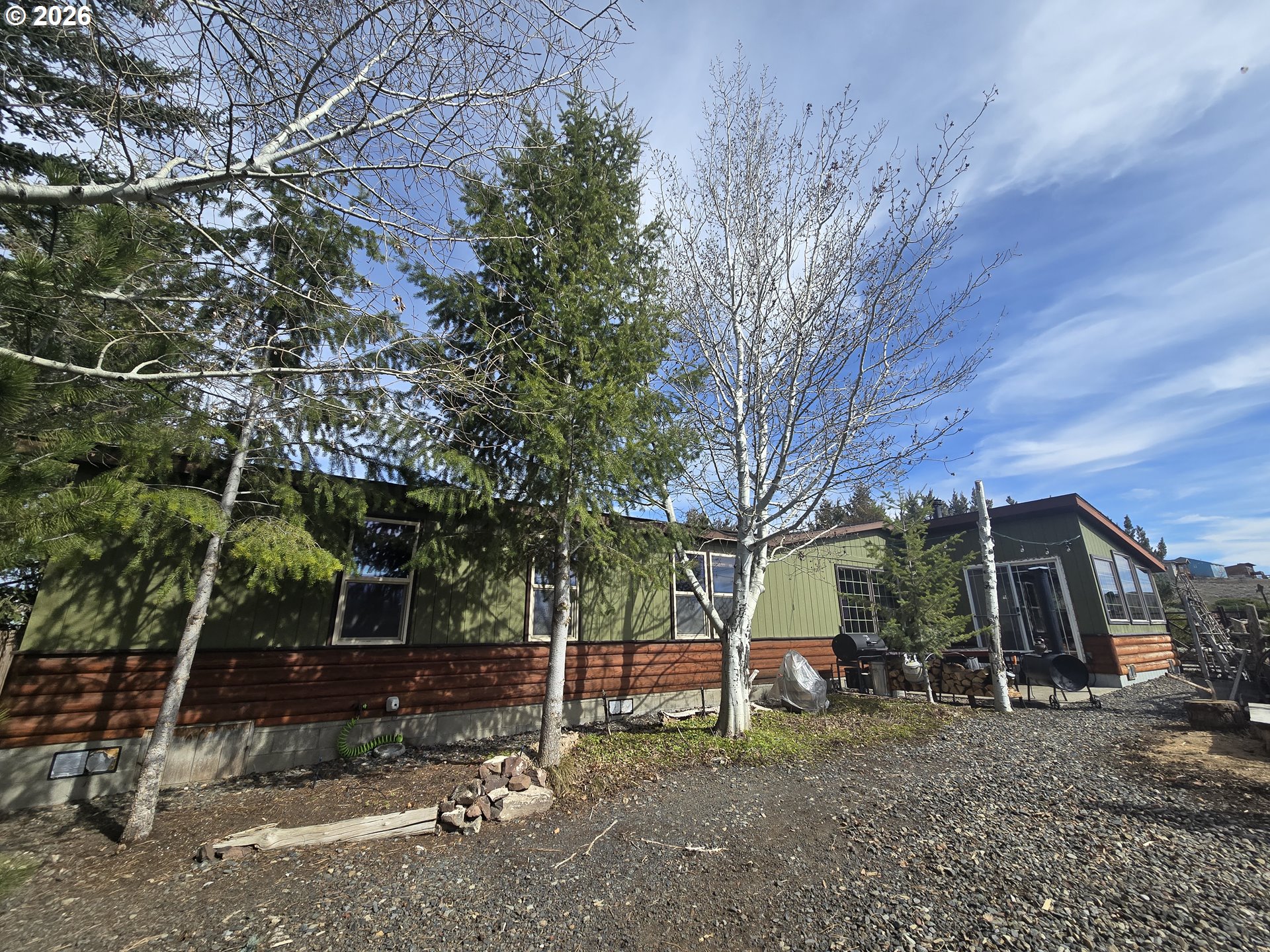 704 Residence Street Enterprise, OR 97828 - Photo 1 of 26 a view of a house with a yard