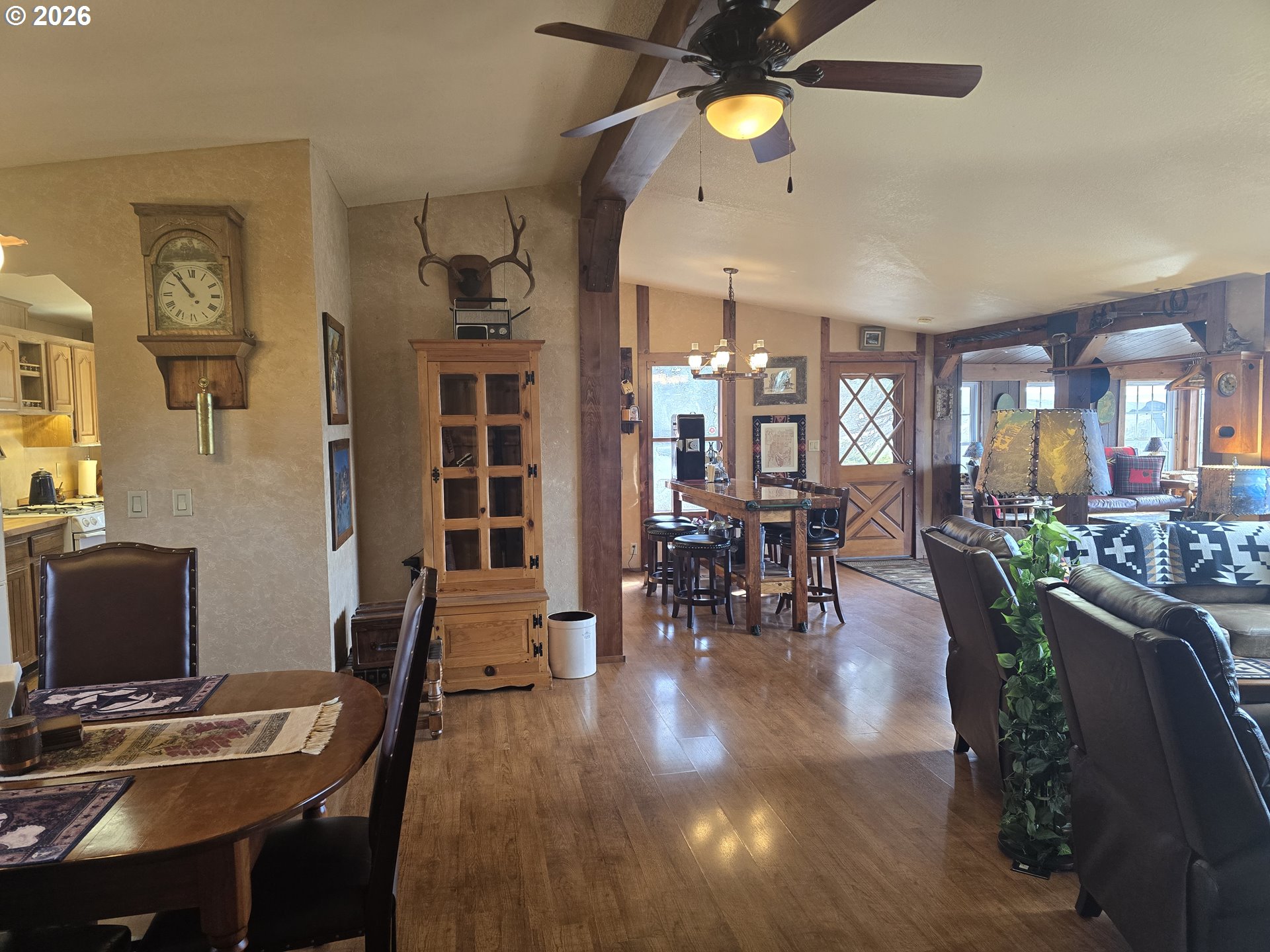 704 Residence Street Enterprise, OR 97828 - Photo 11 of 26 a dining room with furniture and wooden floor