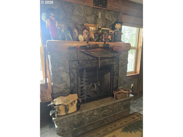 a living room with furniture and flat screen tv