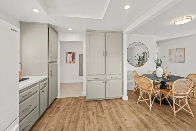 a bathroom with a granite countertop sink and a vanity