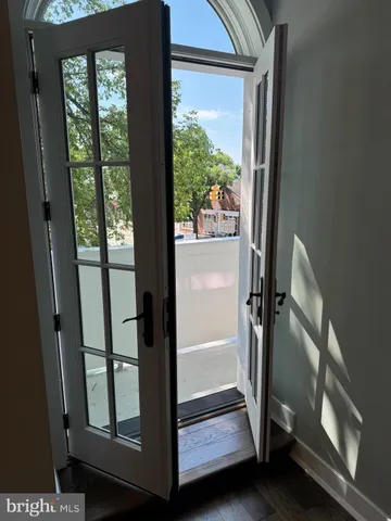 a view of street with parked cars