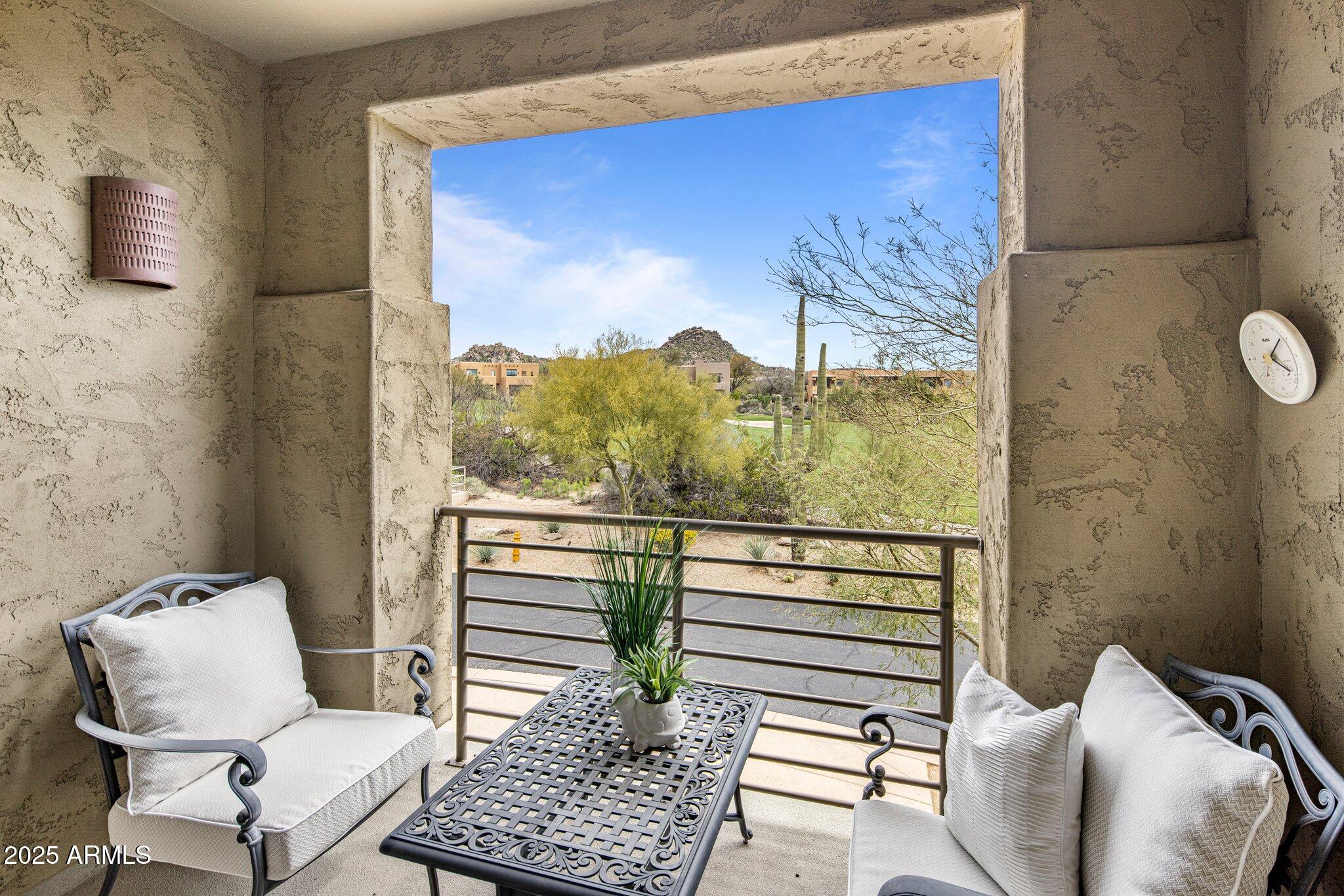 10260 East White Feather Lane, Unit 2003 Scottsdale, AZ 85262 - Photo 17 of 24 a view of a two chairs in the balcony