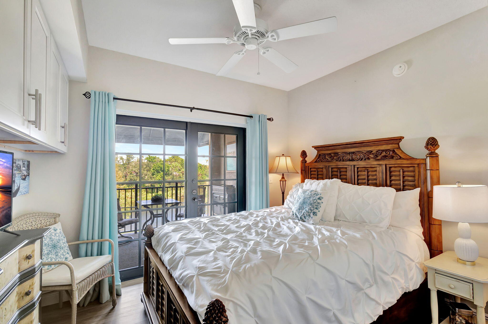 4903 Midtown Lane, Unit 3313 Palm Beach Gardens, FL 33418 - Photo 17 of 81 a bedroom with a bed and a table