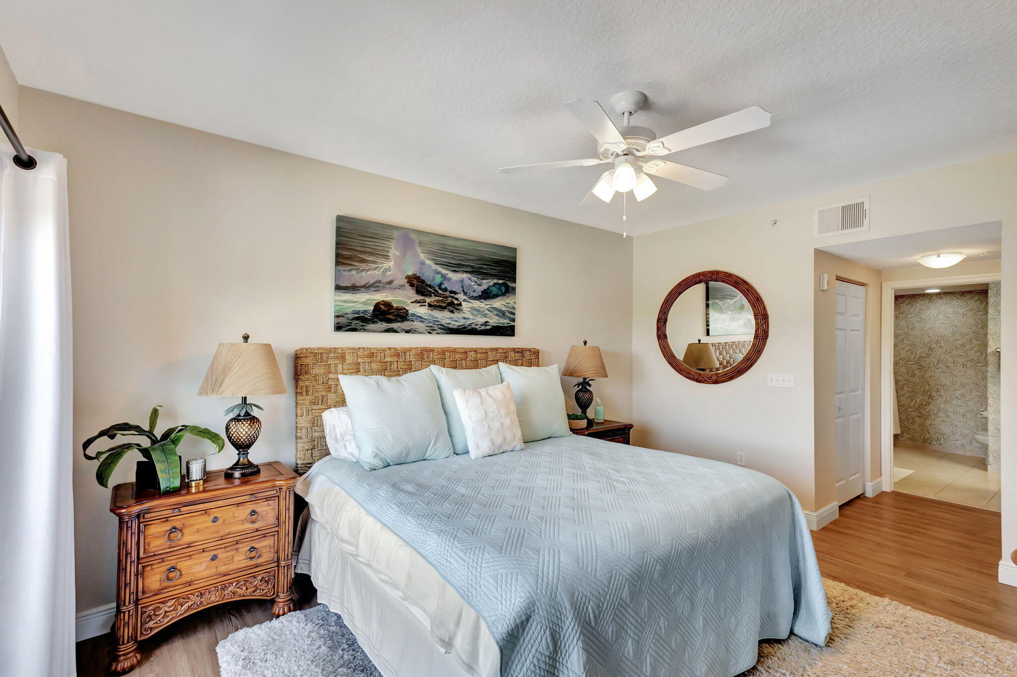 4903 Midtown Lane, Unit 3313 Palm Beach Gardens, FL 33418 - Photo 24 of 81 a bedroom with a bed and a chandelier