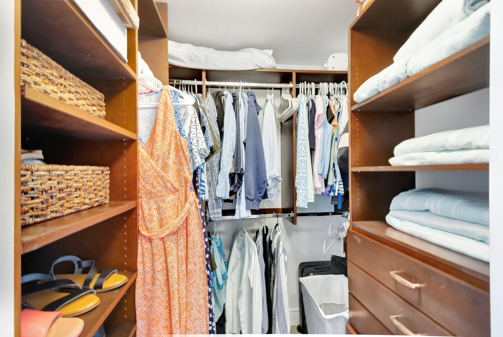 4903 Midtown Lane, Unit 3313 Palm Beach Gardens, FL 33418 - Photo 25 of 81 a view of walk in closet with clothes and shoes