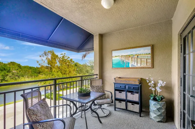 a living room with fireplace furniture and a flat screen tv