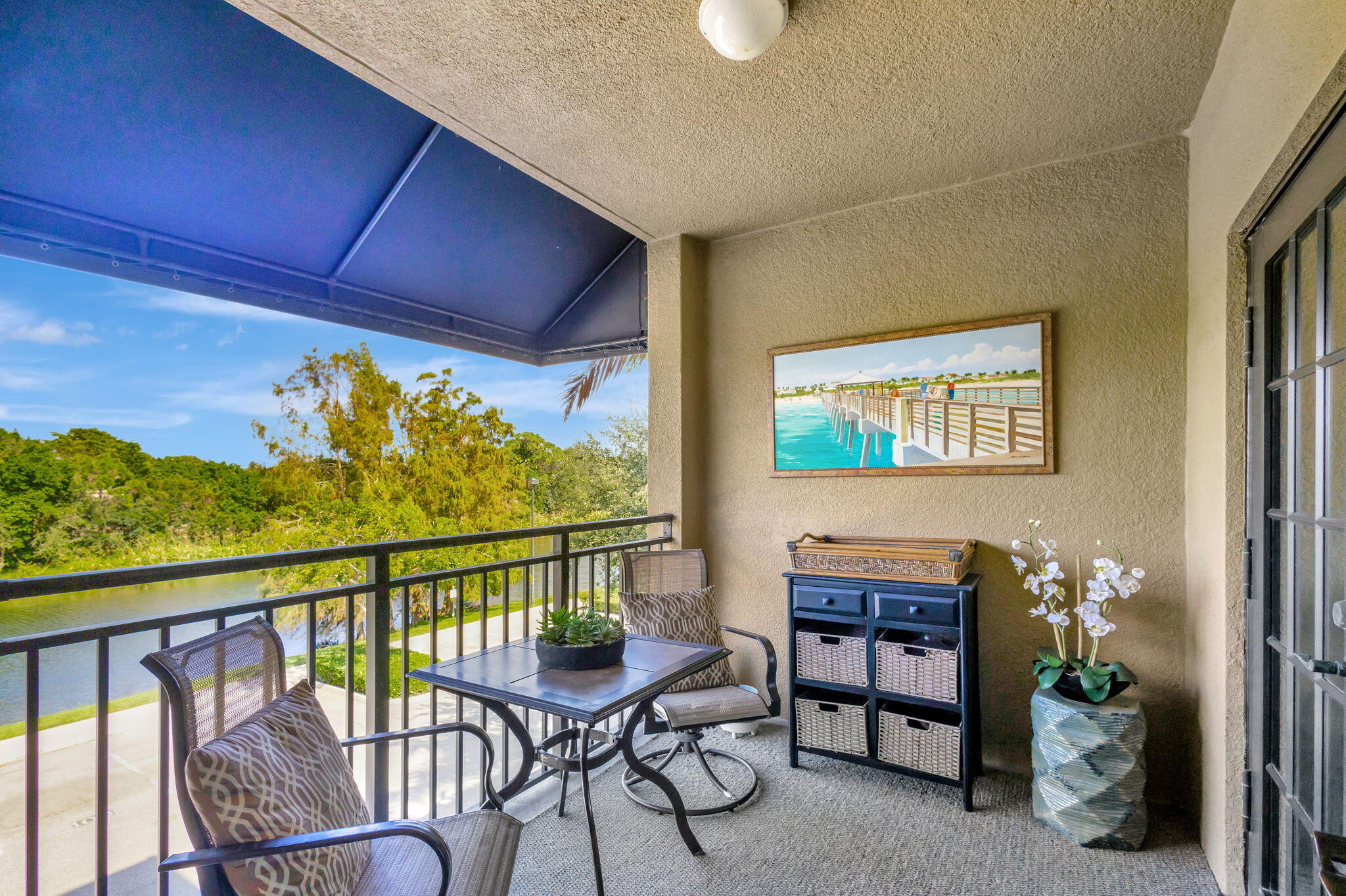 4903 Midtown Lane, Unit 3313 Palm Beach Gardens, FL 33418 - Photo 31 of 81 a view of a chairs in balcony