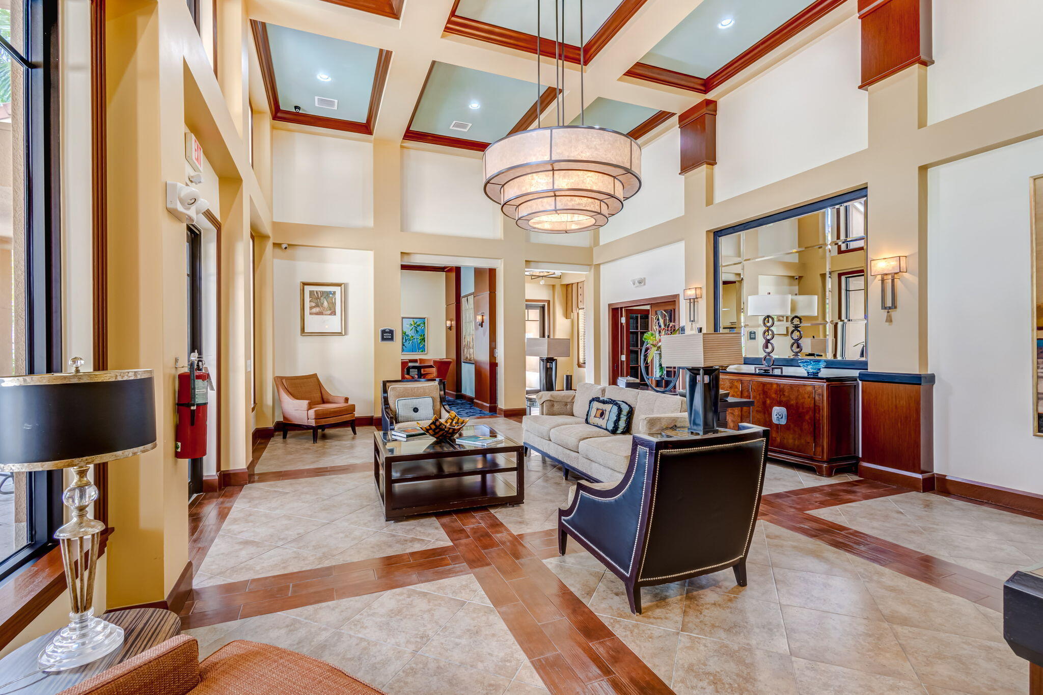 4903 Midtown Lane, Unit 3313 Palm Beach Gardens, FL 33418 - Photo 46 of 81 a living room with fireplace furniture and a flat screen tv