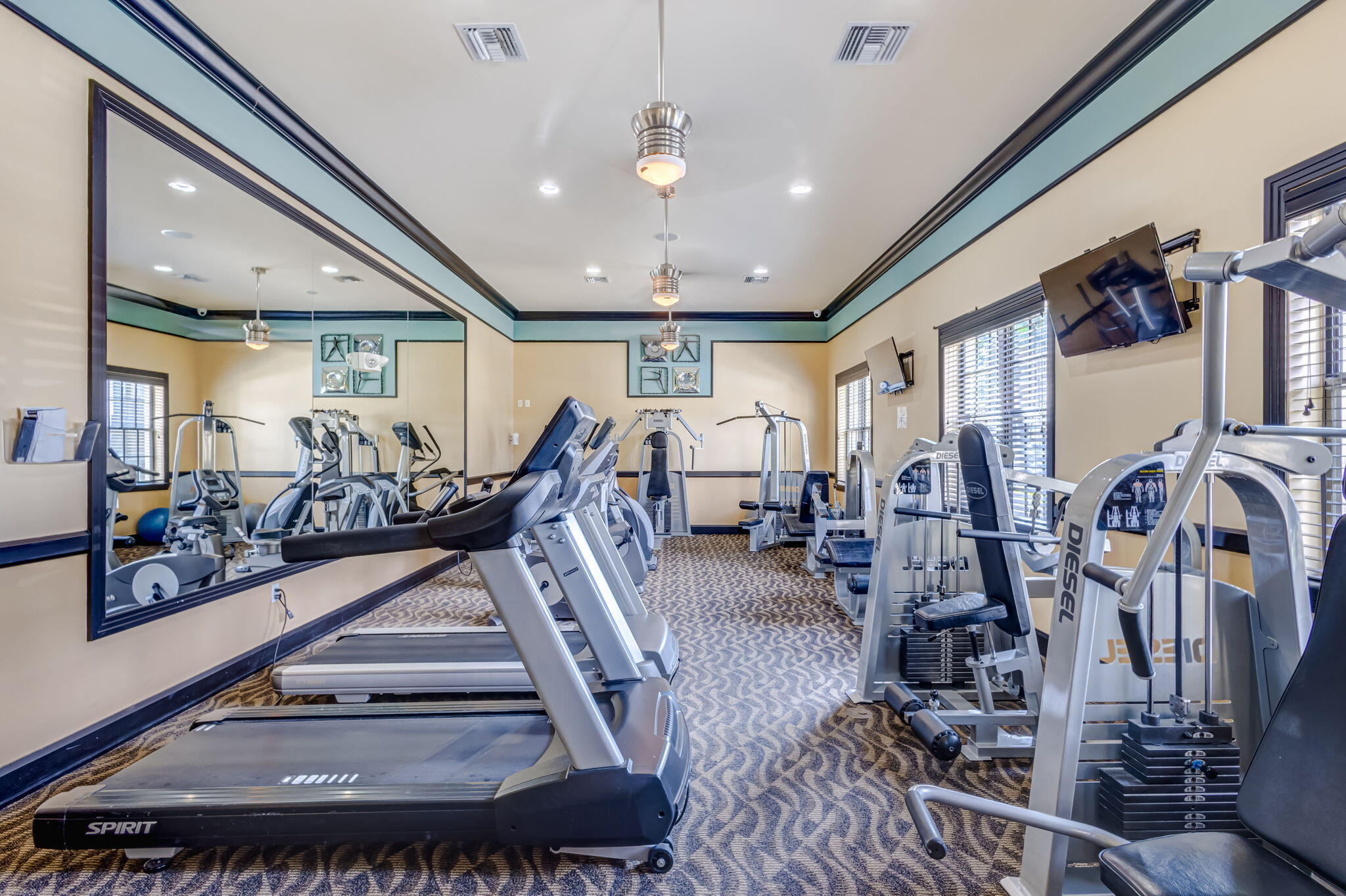 4903 Midtown Lane, Unit 3313 Palm Beach Gardens, FL 33418 - Photo 50 of 81 a view of a room with gym equipment
