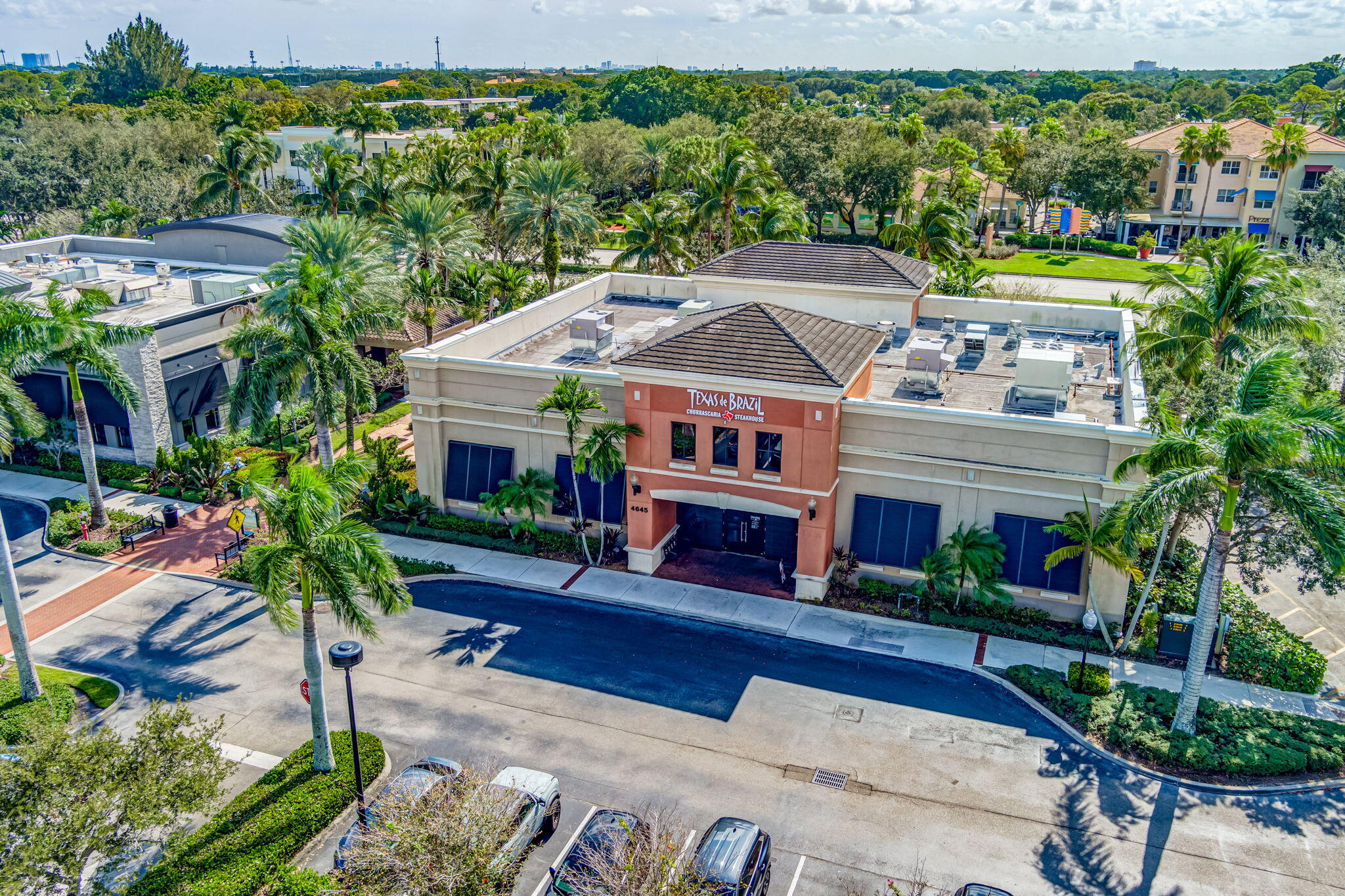 4903 Midtown Lane, Unit 3313 Palm Beach Gardens, FL 33418 - Photo 75 of 81 a front view of a house with garden