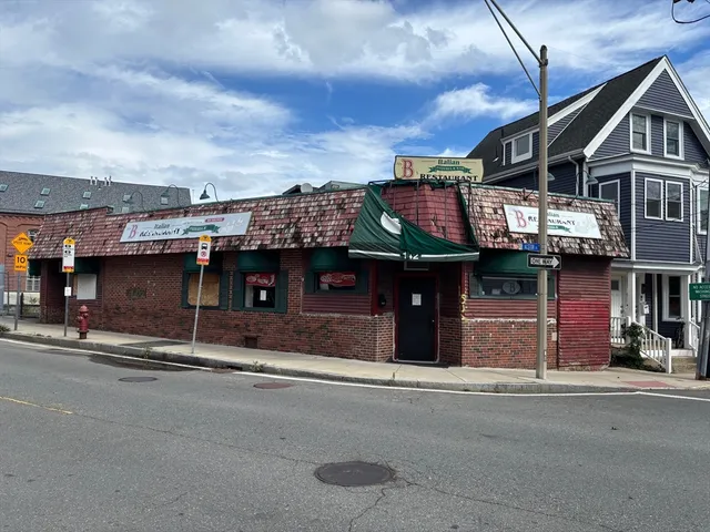a view of brick building with a street light