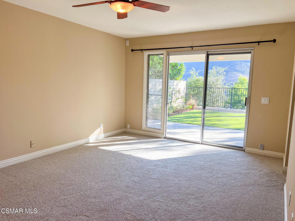 5458 Softwind Way Agoura Hills, CA 91301 - Photo 17 of 31 a view of an empty room with a window