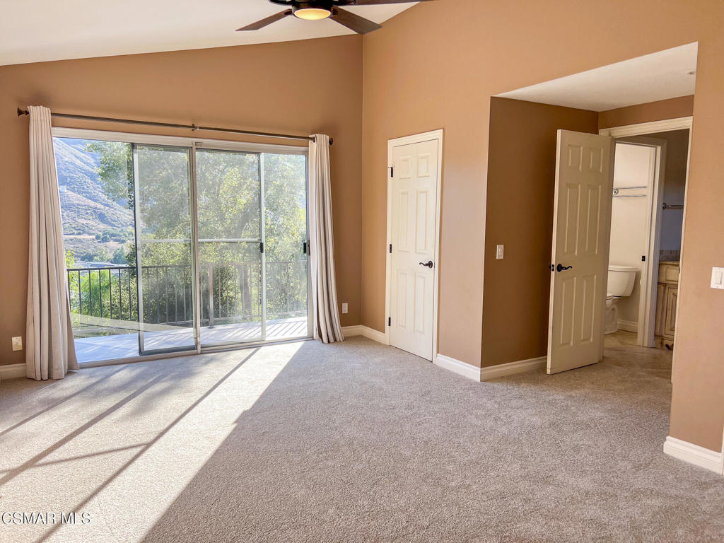 5458 Softwind Way Agoura Hills, CA 91301 - Photo 20 of 31 a view of empty room with floor to ceiling window
