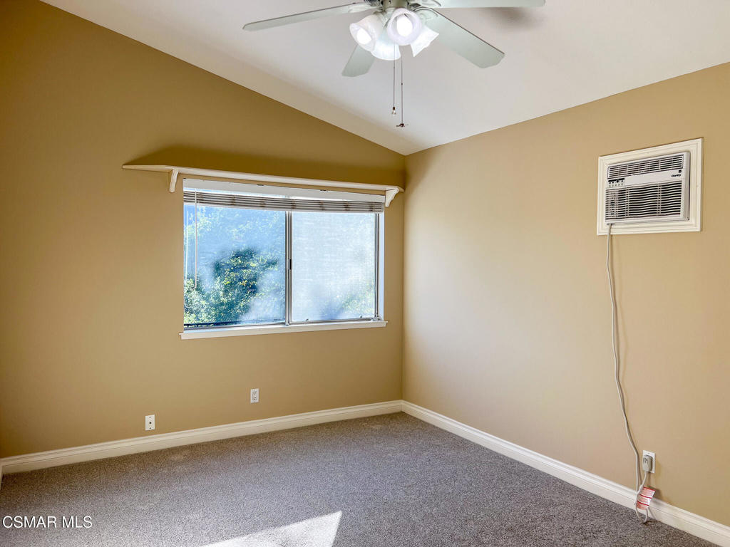 5458 Softwind Way Agoura Hills, CA 91301 - Photo 26 of 31 a view of an empty room with a window