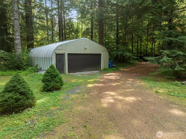 a front view of a house with yard