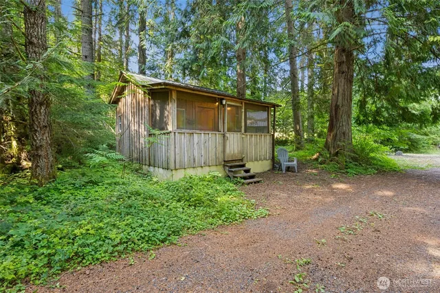 a backyard of a house with lots of green space