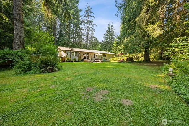 a view of a house with a big yard