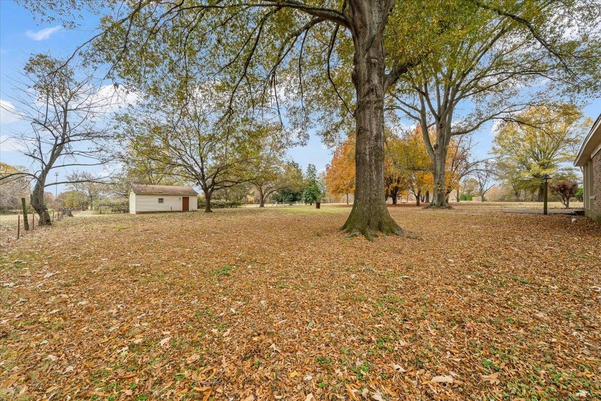 10060 Rosemark Road Atoka, TN 38004 - Photo 22 of 26 a view of outdoor space with deck