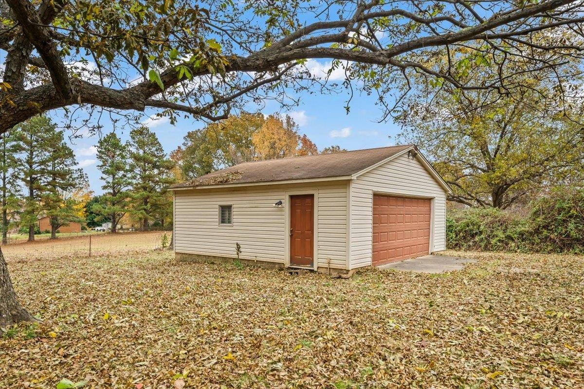 10060 Rosemark Road Atoka, TN 38004 - Photo 23 of 26 a house with a yard