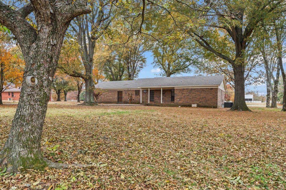 10060 Rosemark Road Atoka, TN 38004 - Photo 25 of 26 a front view of a house with a garden